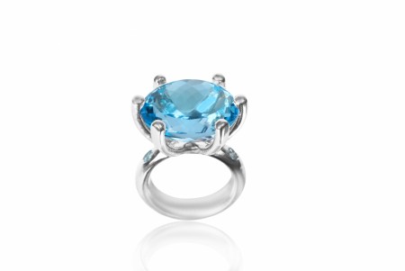 Cocktail claw ring med Topaz